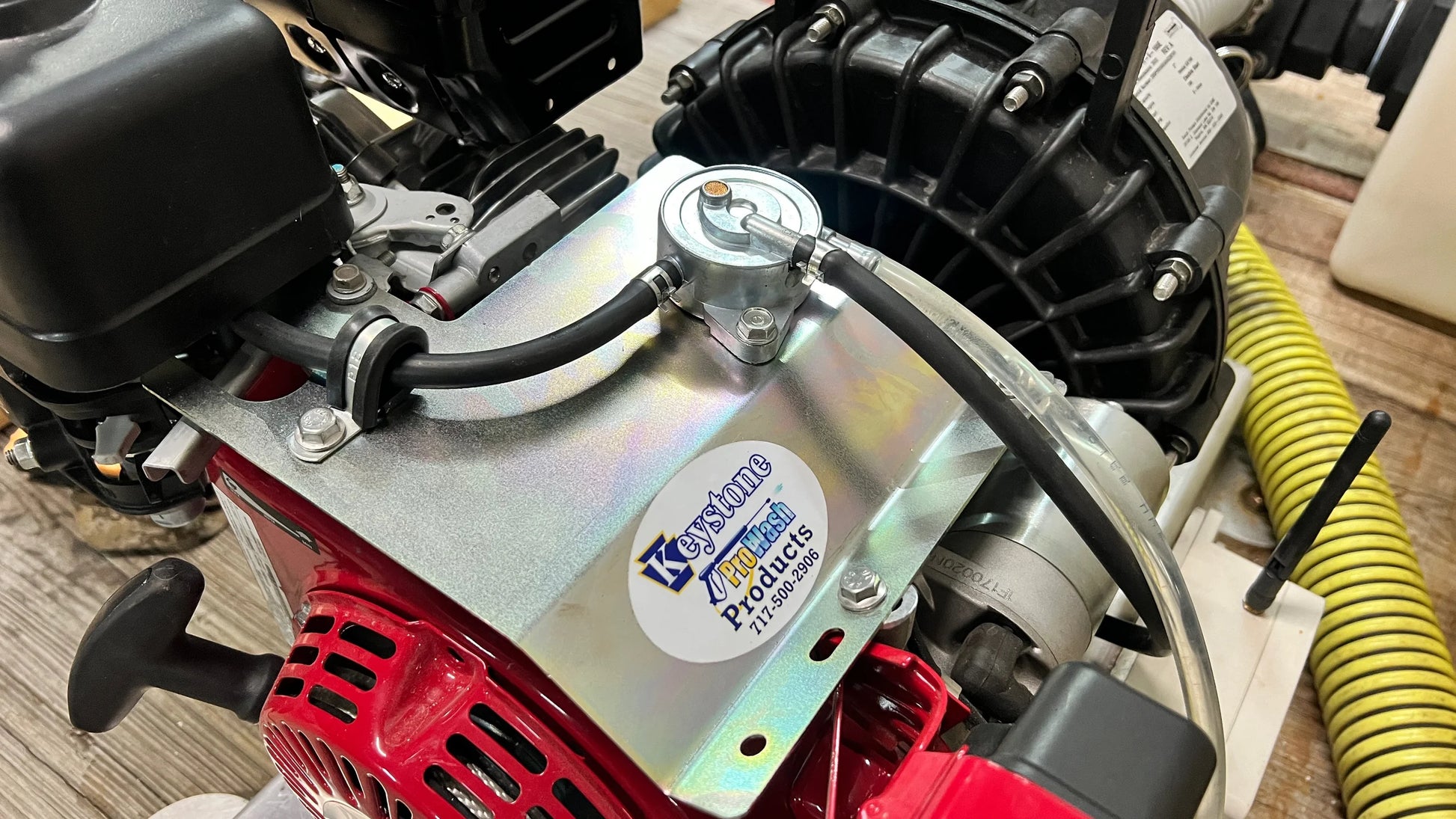 Close-up of fuel line in Fuel Tank Delete Kit for Honda GX and Briggs XR