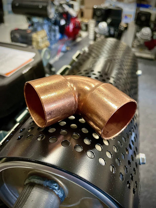 Side view of 1-1/4in Honda Muffler Directional Angle for engine exhaust