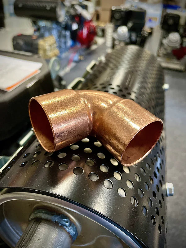 Side view of 1-1/4in Honda Muffler Directional Angle for engine exhaust

