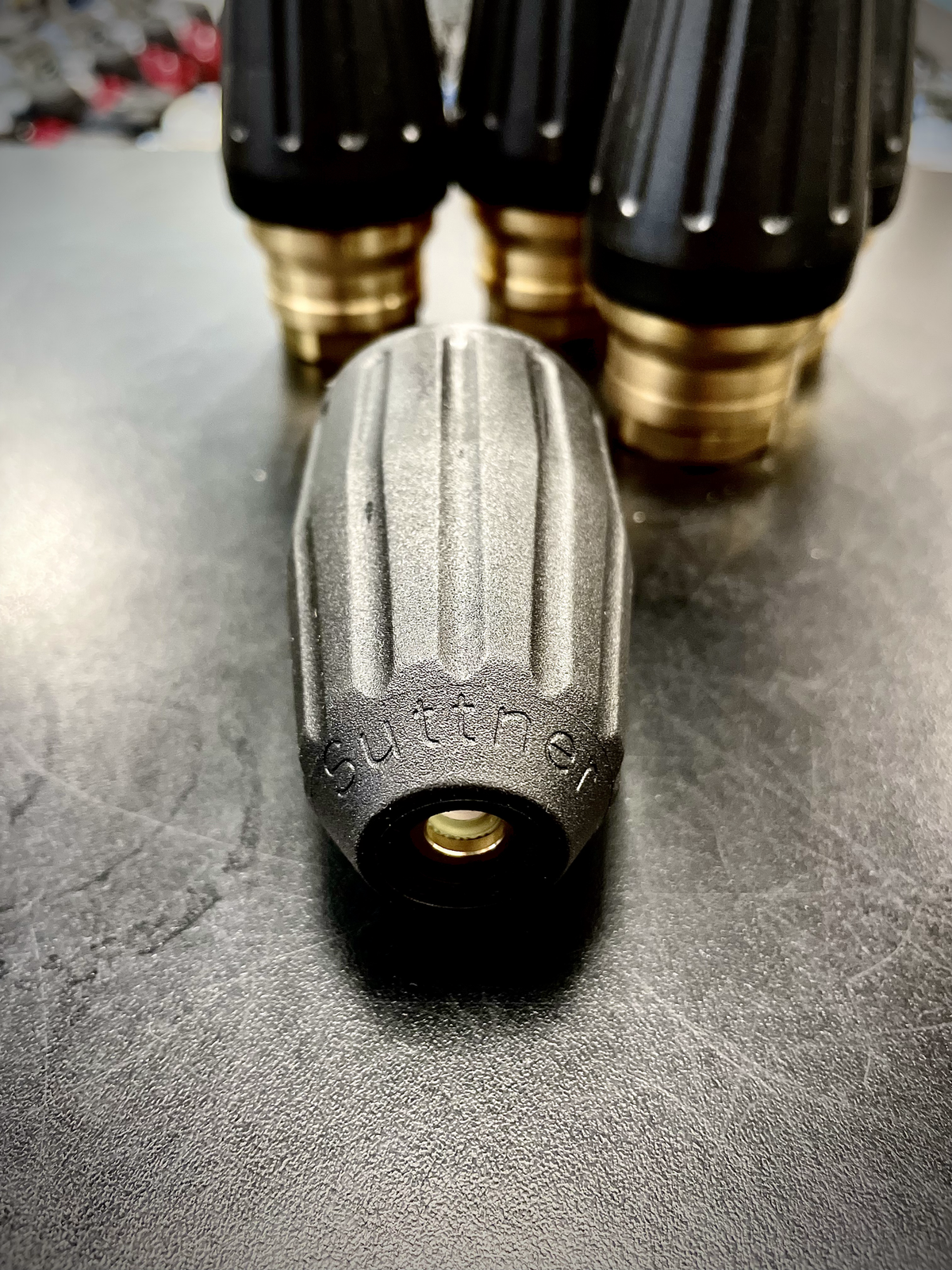 Close-up of a Suttner turbo nozzle housing with logo