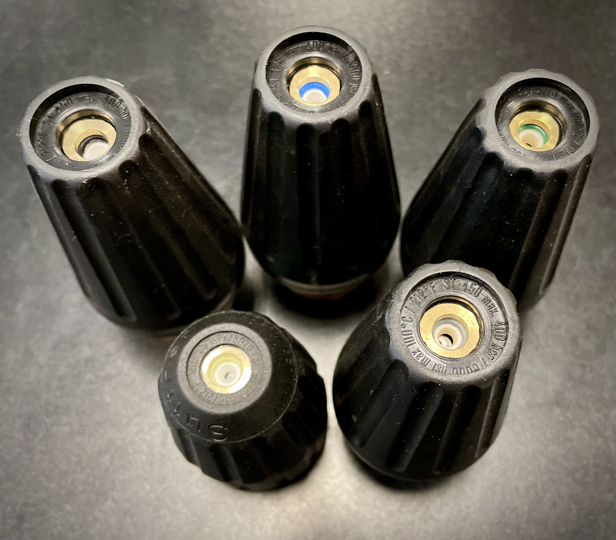 Suttner turbo nozzles in several sizes, top view of the orifices